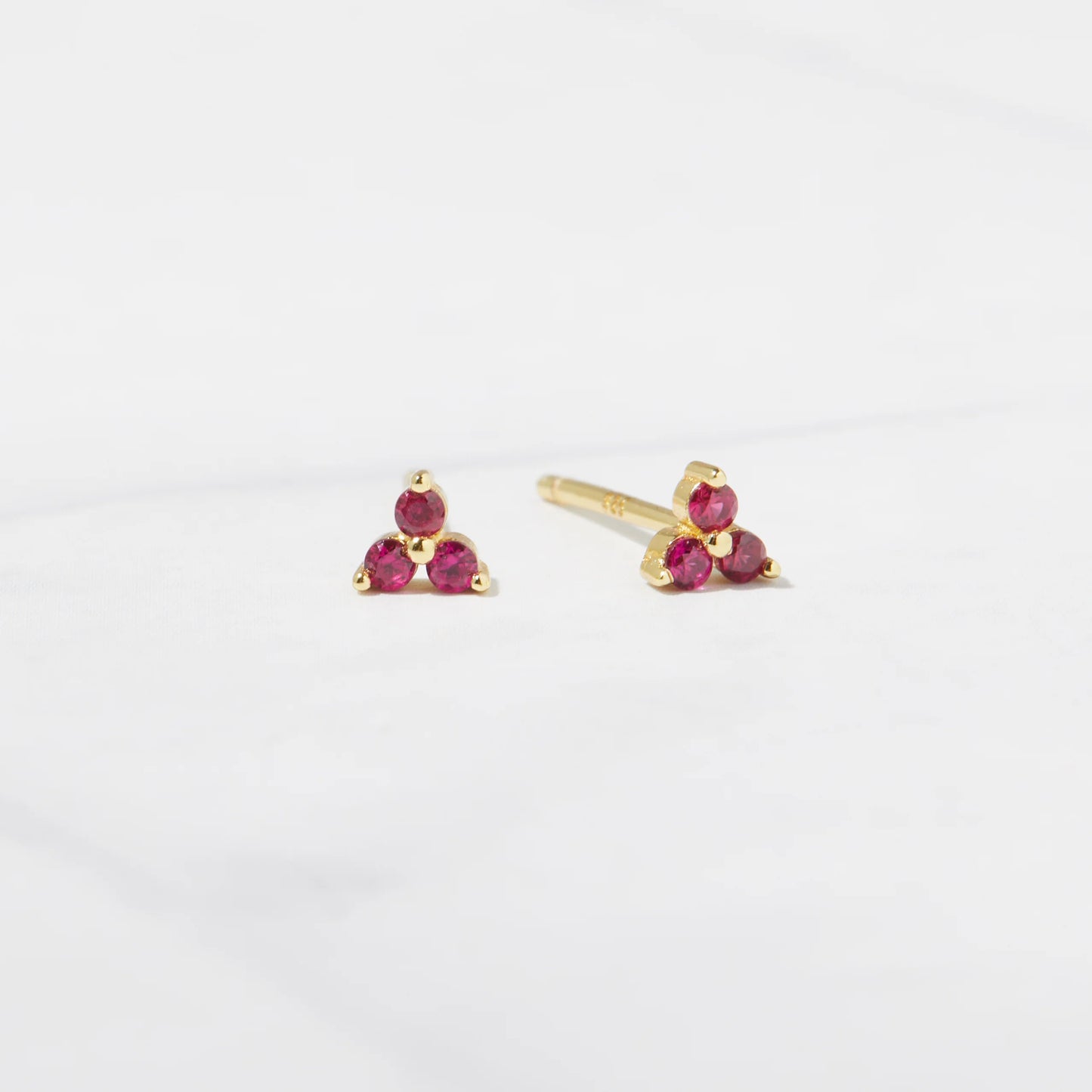 Teeny tiny ruby trinity stud